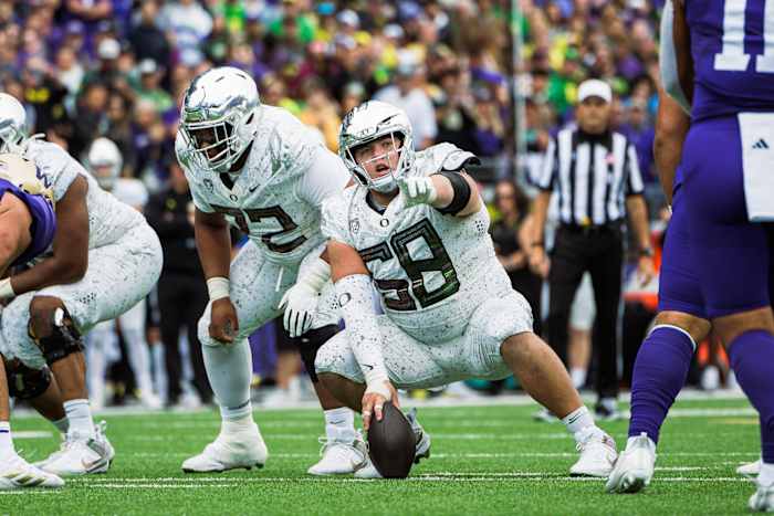 Oregon Ducks center Jackson Powers-Johnson calling pre-snap against the Washington Huskies.